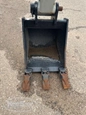 Used Bucket in yard,Back of used Bucket,Side of used Werk Brau Bucket,Front of used bucket